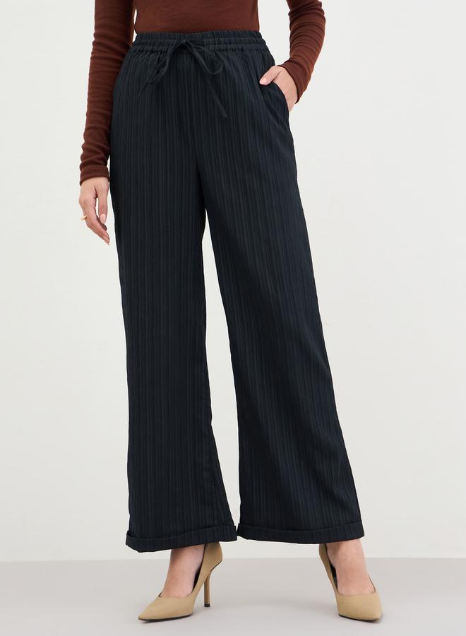 Styli Women Black Pinstripe Wide Leg Trousers - Image 1